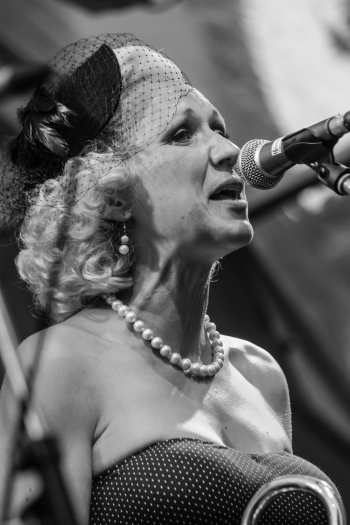 Monochrome Photo of Singing Woman