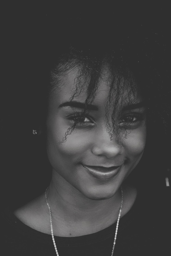 Monochrome Photo of Smiling Woman Monochrome Photo of Smiling Woman