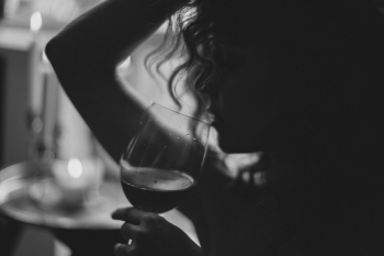 Monochrome Photo of Woman Holding Wine Glass Monochrome Photo of Woman Holding Wine Glass