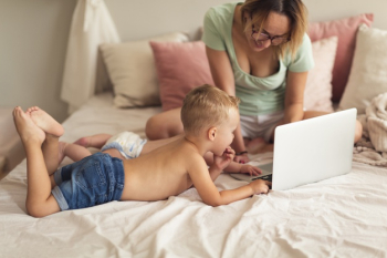 Mother and children looking at laptop Free Photo Mother and children looking at laptop Free Photo