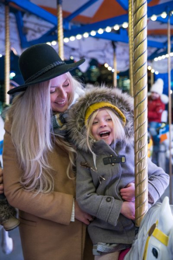 Mother And Daughter On Carousel Mother And Daughter On Carousel