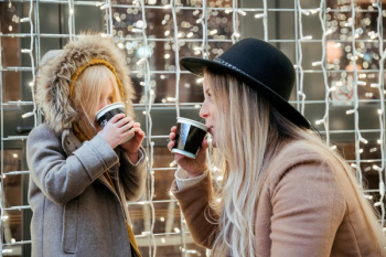 Mother Daughter Sharing Hot Beverages Mother Daughter Sharing Hot Beverages