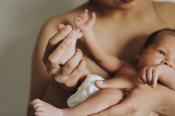 Mother holding her infant baby | Free Photo - rawpixel