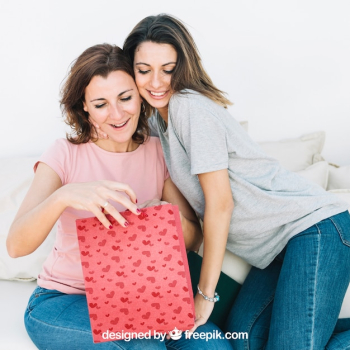 Mothers day mockup with daughter and mother looking into bag