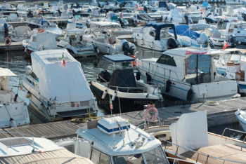 Motorboats Docked In A Harbor Motorboats Docked In A Harbor