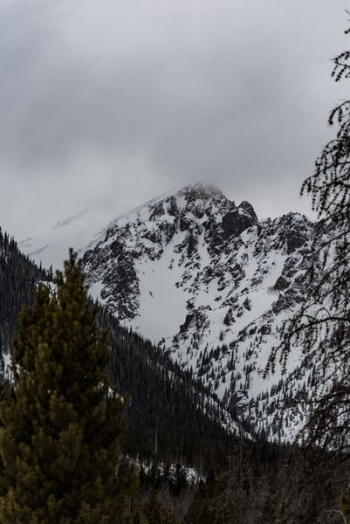 mountain alps under cloudy sky mountain alps under cloudy sky