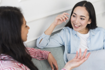Multiethnic women chatting at home Free Photo Multiethnic women chatting at home Free Photo