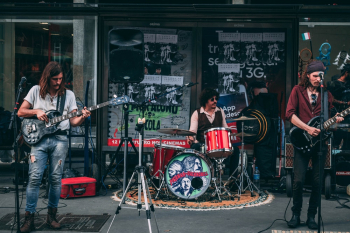 Music Band Performing In Front Of Building Music Band Performing In Front Of Building