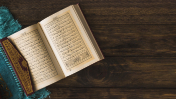 Muslim religious book near rag