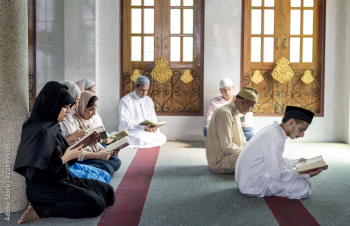 Muslims reading from the quran