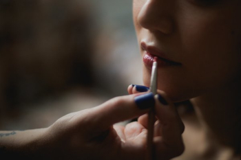 Natural Lip Gloss Being Applied Natural Lip Gloss Being Applied