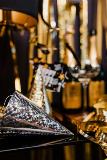 New Years Eve party - shiny golden decorations New Years Eve party - shiny golden decorations