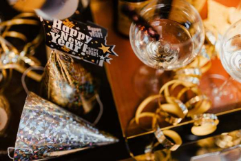 New Years Eve party - shiny golden decorations New Years Eve party - shiny golden decorations