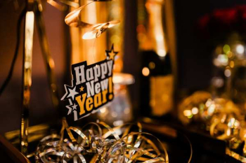 New Years Eve party - shiny golden decorations New Years Eve party - shiny golden decorations