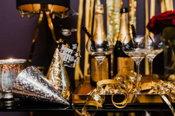 New Years Eve party - shiny golden decorations New Years Eve party - shiny golden decorations