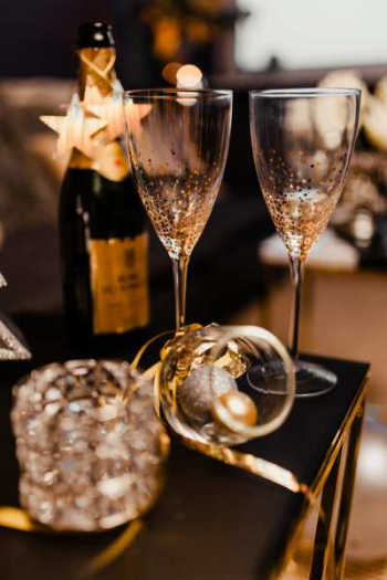 New Years Eve party - shiny golden decorations New Years Eve party - shiny golden decorations