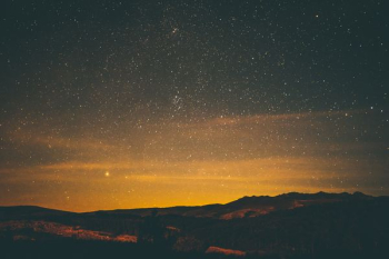 night sky with stars above mountain night sky with stars above mountain