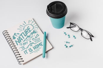 Notebook mockup with take away coffee cup Free Psd