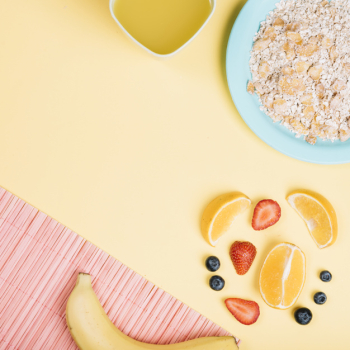 Oatmeal on plate with fruits on table Oatmeal on plate with fruits on table