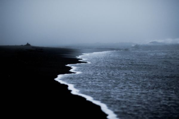 ocean water under gray sky ocean water under gray sky