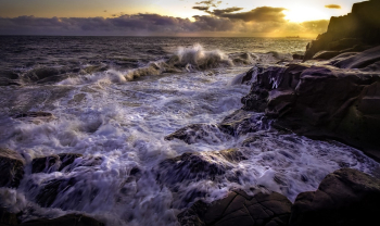 Ocean Waves Crashing on Rocks during Sunset Ocean Waves Crashing on Rocks during Sunset
