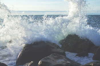 ocean waves in coastal rocks during daytime ocean waves in coastal rocks during daytime