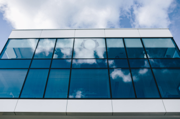 Office building windows and blue sky Office building windows and blue sky