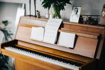 Old piano with sheet music Old piano with sheet music