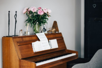 Old piano with sheet music Old piano with sheet music