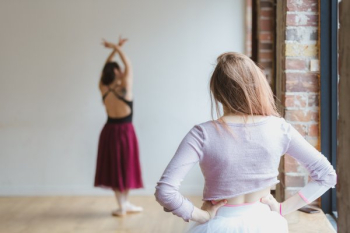 One Dancer Watches Another One Dancer Watches Another