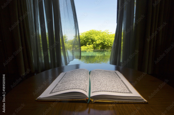 Open holy Koran book in the room