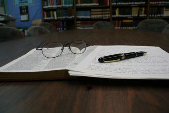 Opened White Notebook on Tabletop Opened White Notebook on Tabletop