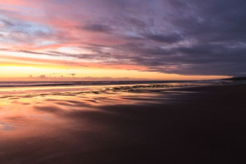 orange sunset in ocean orange sunset in ocean