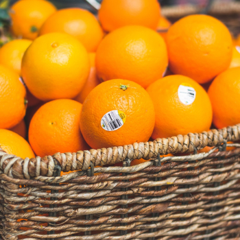 Oranges in Brown Wicker Basket Oranges in Brown Wicker Basket