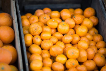 oranges lot on wooden case oranges lot on wooden case