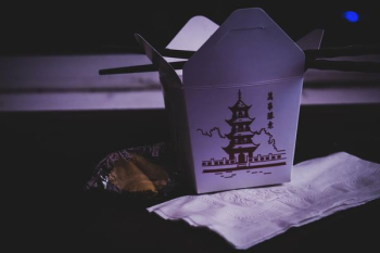 pagoda-printed gable carton on brown surface pagoda-printed gable carton on brown surface