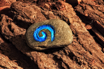Painted stone on a rock. | Free Photo - rawpixel Painted stone on a rock. | Free Photo - rawpixel