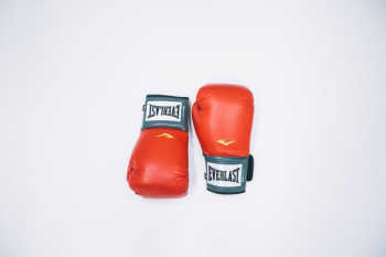 pair of red-and-black Everlast boxing gloves pair of red-and-black Everlast boxing gloves