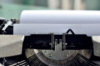 paper on typewriter showing Hello February 2016 text paper on typewriter showing Hello February 2016 text