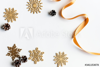 Paper snow flakes on white background with design space