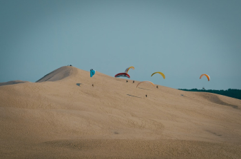 Paragliders On Sand Dunes Paragliders On Sand Dunes