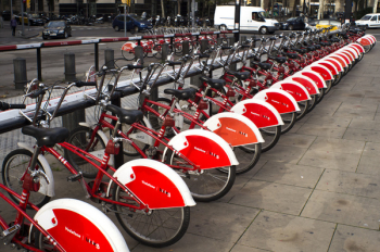 Parked Red and White Bicycles Parked Red and White Bicycles