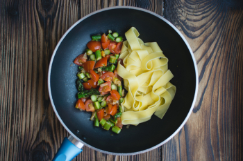 Pasta tagliatelle with asparagus and tomatoes Pasta tagliatelle with asparagus and tomatoes
