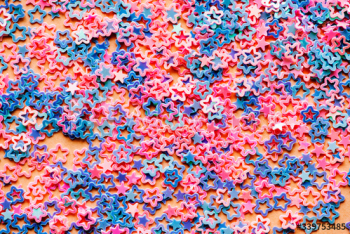 Pastel star sequin abstract background