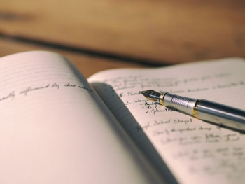 pen on white lined paper selective focus photography pen on white lined paper selective focus photography