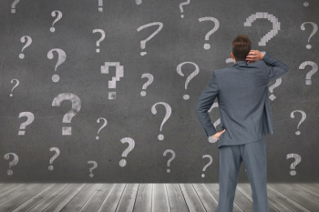Pensive man with question marks background Pensive man with question marks background
