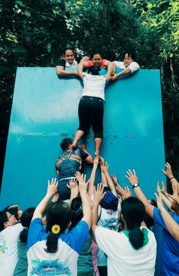 People Climbing Wall People Climbing Wall