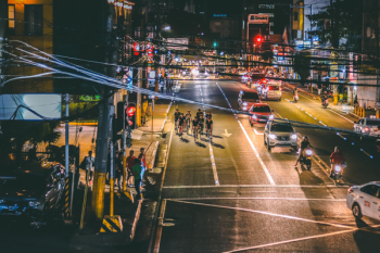 People Cycling on Road during Nighttime People Cycling on Road during Nighttime