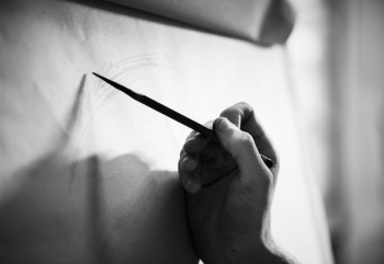 People drawing portraits by pencil People drawing portraits by pencil