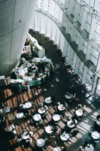 people eating inside building people eating inside building